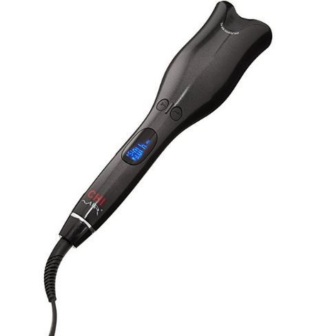 Black automatic curling iron with a digital temperature display and control buttons, featuring a curved barrel and swivel cord.
