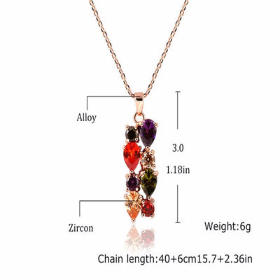 Shiny rose gold-tone necklace, earrings, and ring set with multi-colored teardrop and round zircon stones. Ring size 9. - Image 2
