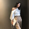 Blusa sin tirantes con hombros al descubierto