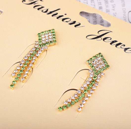 Gold-toned exaggerated butterfly necklace and matching drop earrings set, adorned with clear and champagne rhinestones. - Image 3