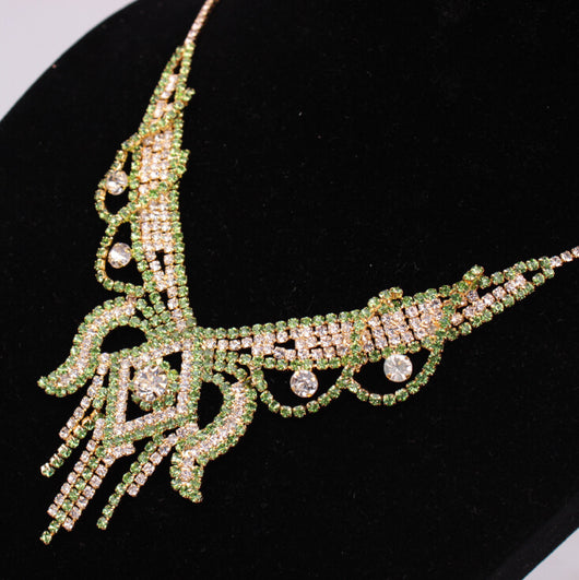 Gold-toned exaggerated butterfly necklace and matching drop earrings set, adorned with clear and champagne rhinestones. - Image 2