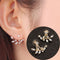 Female little daisy flower pearl earrings Rose Dorado