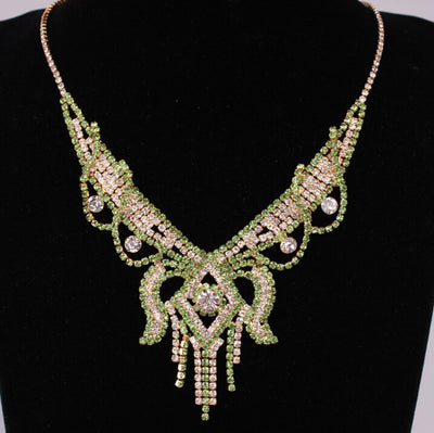 Gold-toned exaggerated butterfly necklace and matching drop earrings set, adorned with clear and champagne rhinestones. - Image 9
