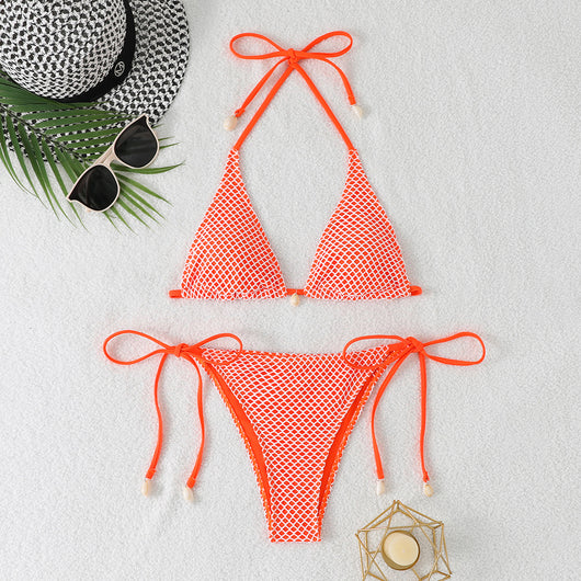 Blue and white mesh triangle bikini set with tie-side bottom and shell accents, displayed on a white beach towel. - Image 7