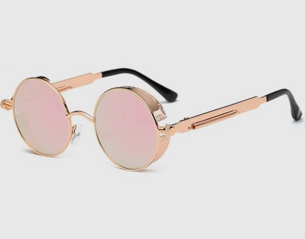 Austin Powers vintage round metal frame sunglasses with clear lenses, gold frames, and black temple tips.