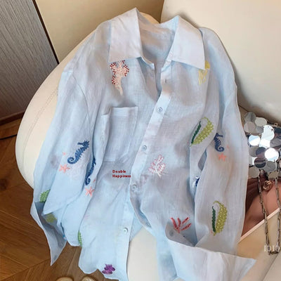 Blusa de Protección Solar con Bordado Floral para Mujer - Image 12