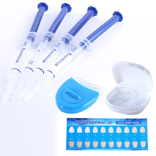 Teeth whitening kit with a blue LED light mouthpiece and a syringe of whitening gel on a white background. - Image 7