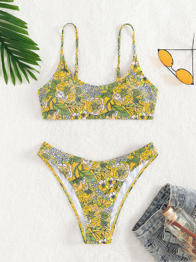 New printed bikini swimsuit with a vibrant floral pattern on a light blue background, featuring a scoop neck top and high-cut bottom. - Image 6
