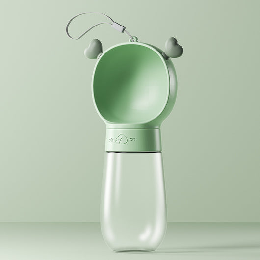Yellow and clear portable pet water bottle with integrated drinking bowl and separate food container for walking dogs. - Image 12