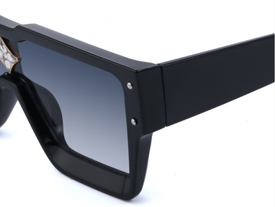 Black large frame square sunglasses with dark lenses and a gold star-shaped embellishment on the bridge. - Image 16