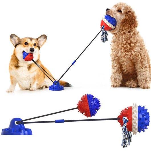 Red, white, and blue textured dog chew toy with rope tassels and a blue suction cup base, shown with a Dalmatian puppy playing. - Image 7