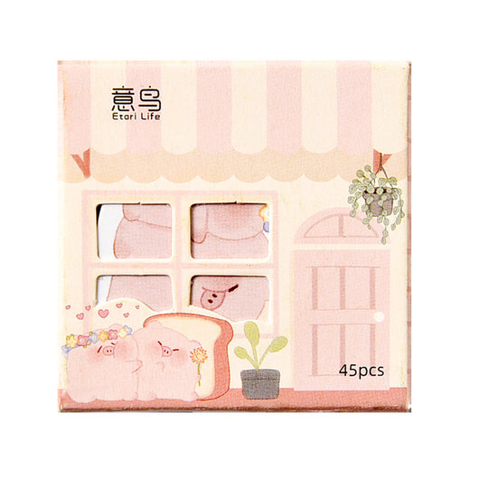 Set of 45 cute penguin paper stickers with various expressions and poses, packaged in a decorative shop-front box. - Image 4
