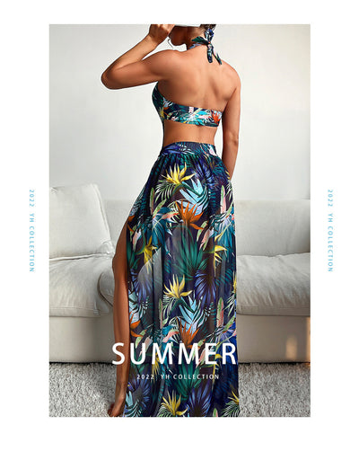 Yellow tropical print three-piece bikini set with halter top, high-waisted bottoms, and long cover-up skirt with high slit. - Image 14