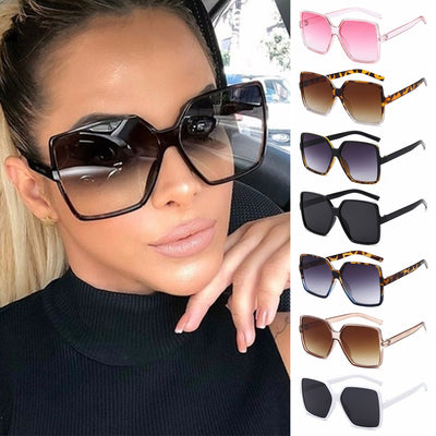 Transparent nude cat-eye sunglasses with brown gradient lenses, featuring a vintage 90s fashion style for women.
