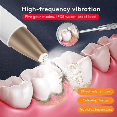 White and gold ultrasonic tooth cleaner with a pointed metal tip, standing in a white charging base. - Image 13