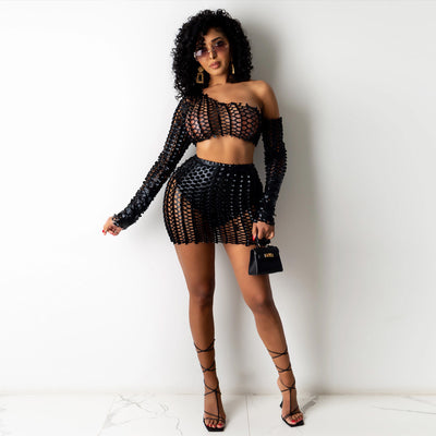 Black net hole hollow-out two-piece set with one-shoulder long-sleeve crop top and matching mini skirt. - Image 17