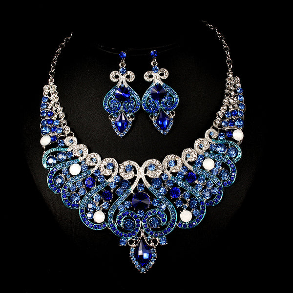 Exaggerated blue rhinestone and pearl bridal necklace and earring set with silver-tone alloy plating. - Image 13
