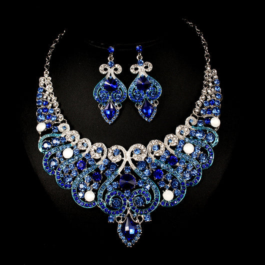 Exaggerated blue rhinestone and pearl bridal necklace and earring set with silver-tone alloy plating. - Image 13