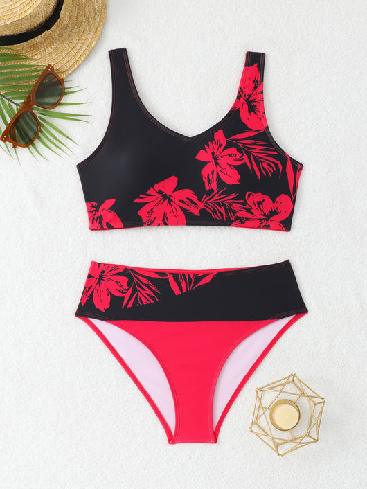 Women's two-piece swimsuit with black and purple floral print. Features a V-neck sports bra top and mid-rise bottom. - Image 29