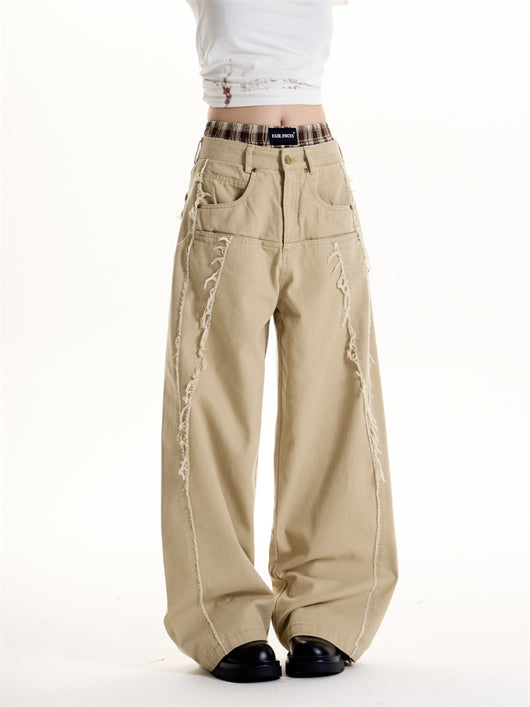 Jeans Vintage Americano con Diseño Deconstruido y Detalles de Borla - Image 10