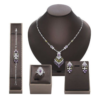 Color zirconium necklace, earrings, bracelet, and ring 4-piece set with purple and green stones. - Image 10