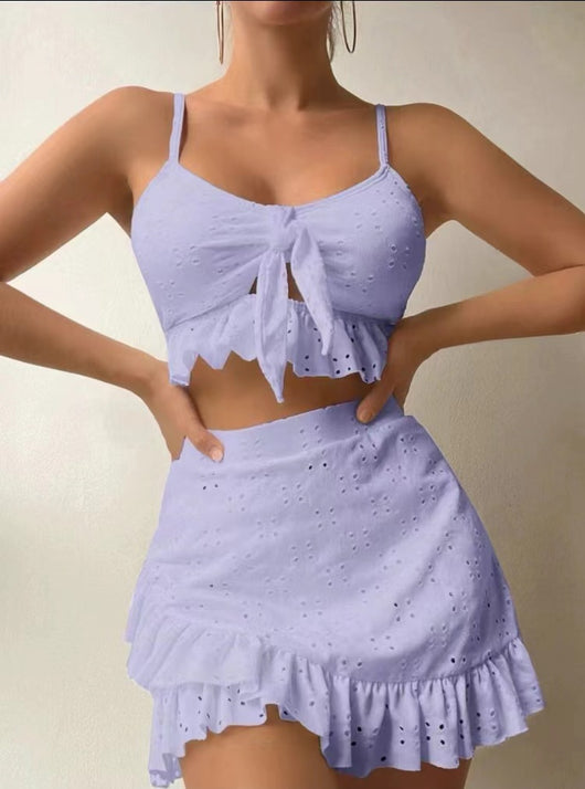 Light blue eyelet two-piece swimsuit set with a tie-front crop top and a matching ruffle-trim hip-hugging skirt. - Image 5