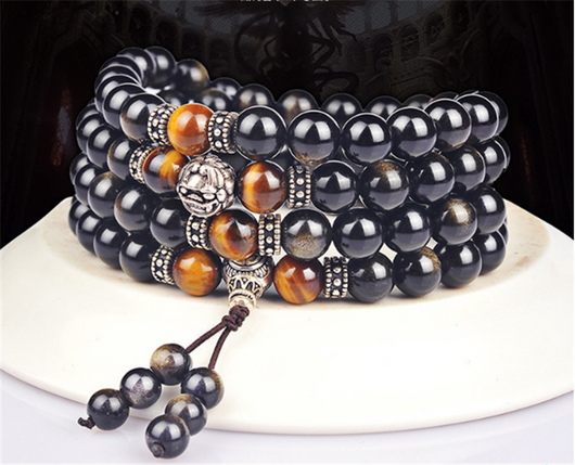 Pulsera de Obsidiana Dorada con 108 Cuentas Buda y Plata Tibetana - Image 9