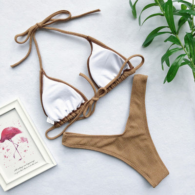 Khaki women's bikini set with a triangle top and high-cut thong bottoms, made from textured nylon fabric. - Image 4