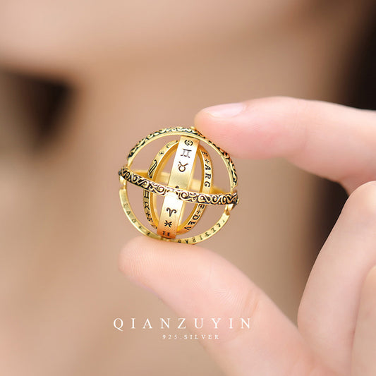 Anillo Universo Giratorio con Bola Astronómica - Diseño Retro para Parejas