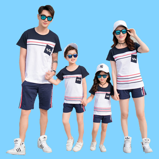 Navy blue children's shorts with white ribbed waistband, beige drawstring, and side pockets. Features red, white, and black side stripes and "LOVING FAMILY" tex - Image 12