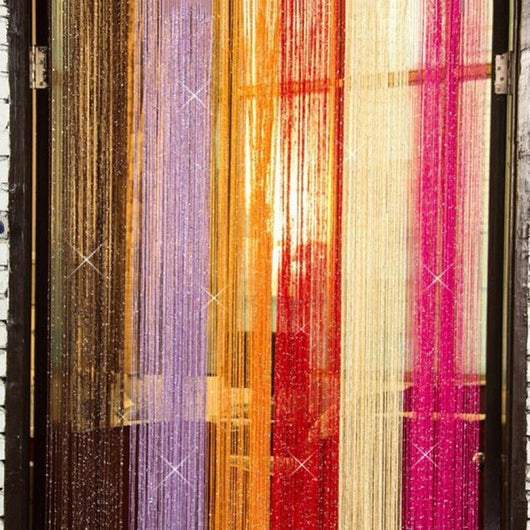 Hand holding a section of a silver shimmering string curtain with sparkling threads, ideal for door or room partition. - Image 6