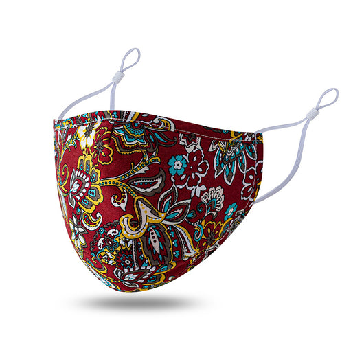 Teal cotton face mask with white floral pattern and brown leaves, featuring adjustable white ear loops. - Image 5