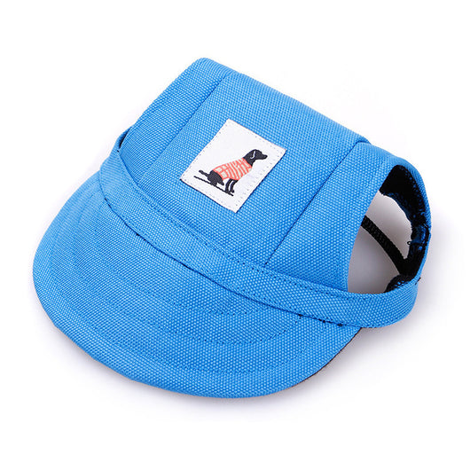 Orange pet baseball cap with ear holes and a curved brim, featuring a small patch with a dog graphic. - Image 6