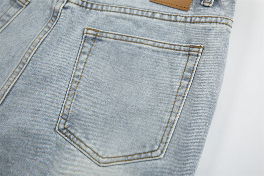 Jeans Holgados Retro con Rotos y Parches para Hombre - Image 10