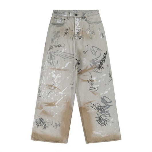 Jeans Hombre con Diseño Graffiti Pintado a Mano y Desgaste Artístico