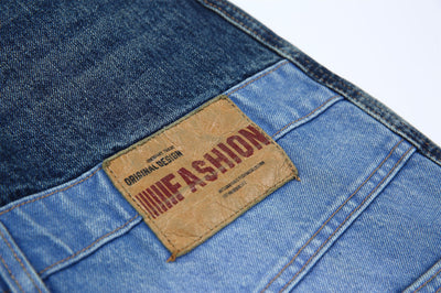 Jeans Vintage Deconstruido con Parches Pesados Lavado Retro - Image 33