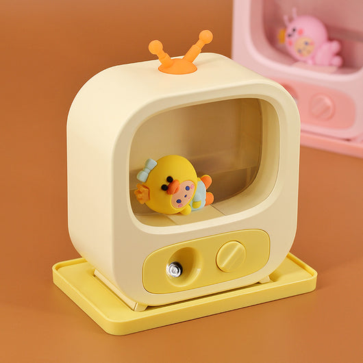Pink TV-shaped desktop humidifier with a cute pink caterpillar figure inside, featuring a mist outlet and control knob. - Image 4