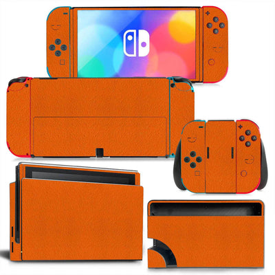 Yellow textured vinyl skin set for Nintendo Switch OLED console, Joy-Cons, and dock, shown disassembled. - Image 14