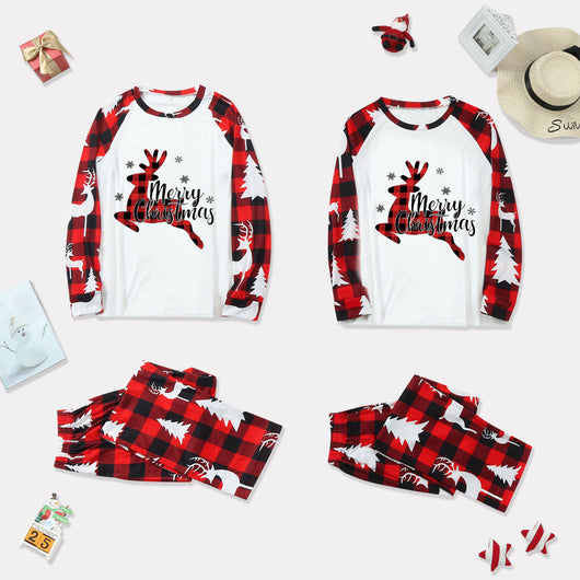 Family matching Christmas pajamas with red and black buffalo plaid, white reindeer, and Christmas tree prints. - Image 10