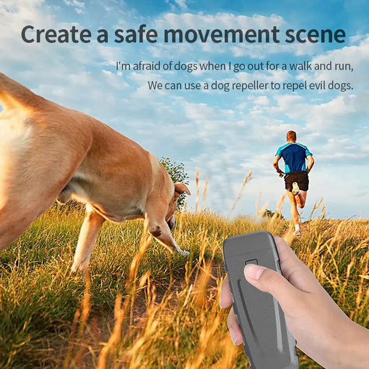 Black and orange handheld ultrasonic dog training device with a Type-C charging port and an orange button. - Image 3