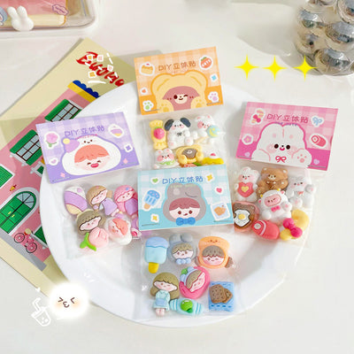 Set of 7 cute 3D resin stickers featuring cartoon characters, an ice cream bar, and a cookie snack.