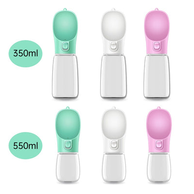 Pink portable pet drinking cup with a clear water reservoir and a paw print button for dispensing water. - Image 7
