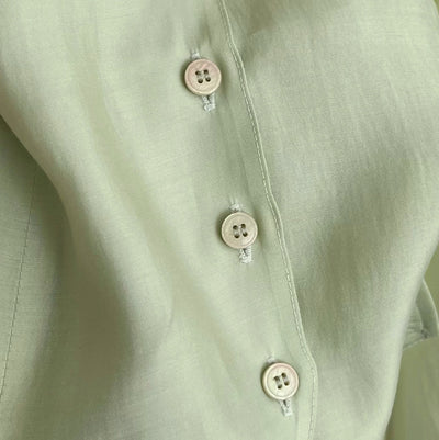 Blusa Escotada con Cordones y Diseño Curvilíneo - Image 5