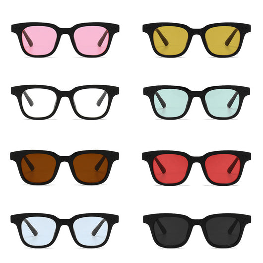 Black frame square sunglasses with light blue lenses, angled on a white background.