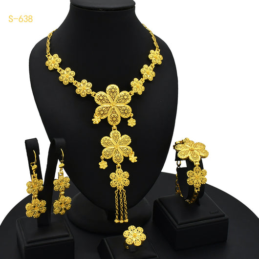 Ornate gold-colored bridal jewelry set with filigree design, including a necklace, drop earrings, bracelet, and ring. - Image 9