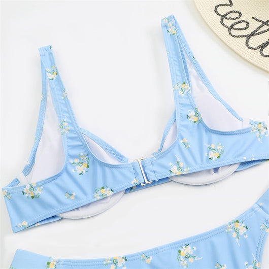 Light blue floral bikini with pink and yellow flowers, featuring an underwire top and high-cut bottom. - Image 13