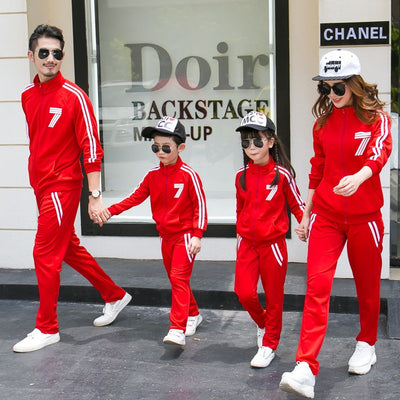Red polyester sports suit with a full-zip jacket featuring white stripes and a '7' graphic, paired with matching pants. - Image 7