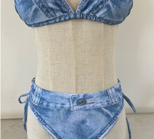 Women's light blue denim print two-piece bikini swimsuit with a halter neck top and tie-side bottoms, styled with a straw hat and sunglasses. - Image 17
