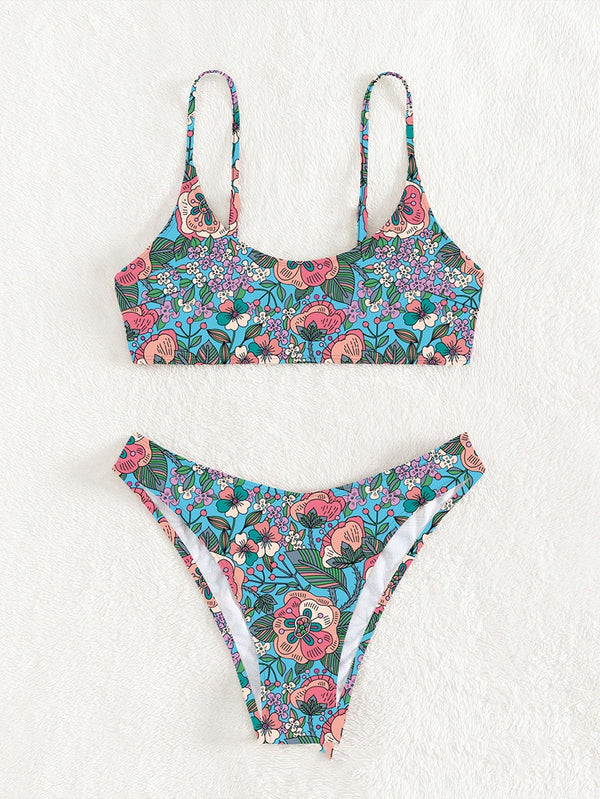 New printed bikini swimsuit with a vibrant floral pattern on a light blue background, featuring a scoop neck top and high-cut bottom. - Image 3