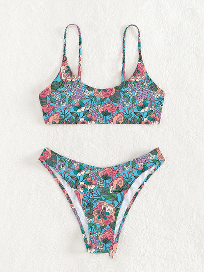 New printed bikini swimsuit with a vibrant floral pattern on a light blue background, featuring a scoop neck top and high-cut bottom. - Image 3